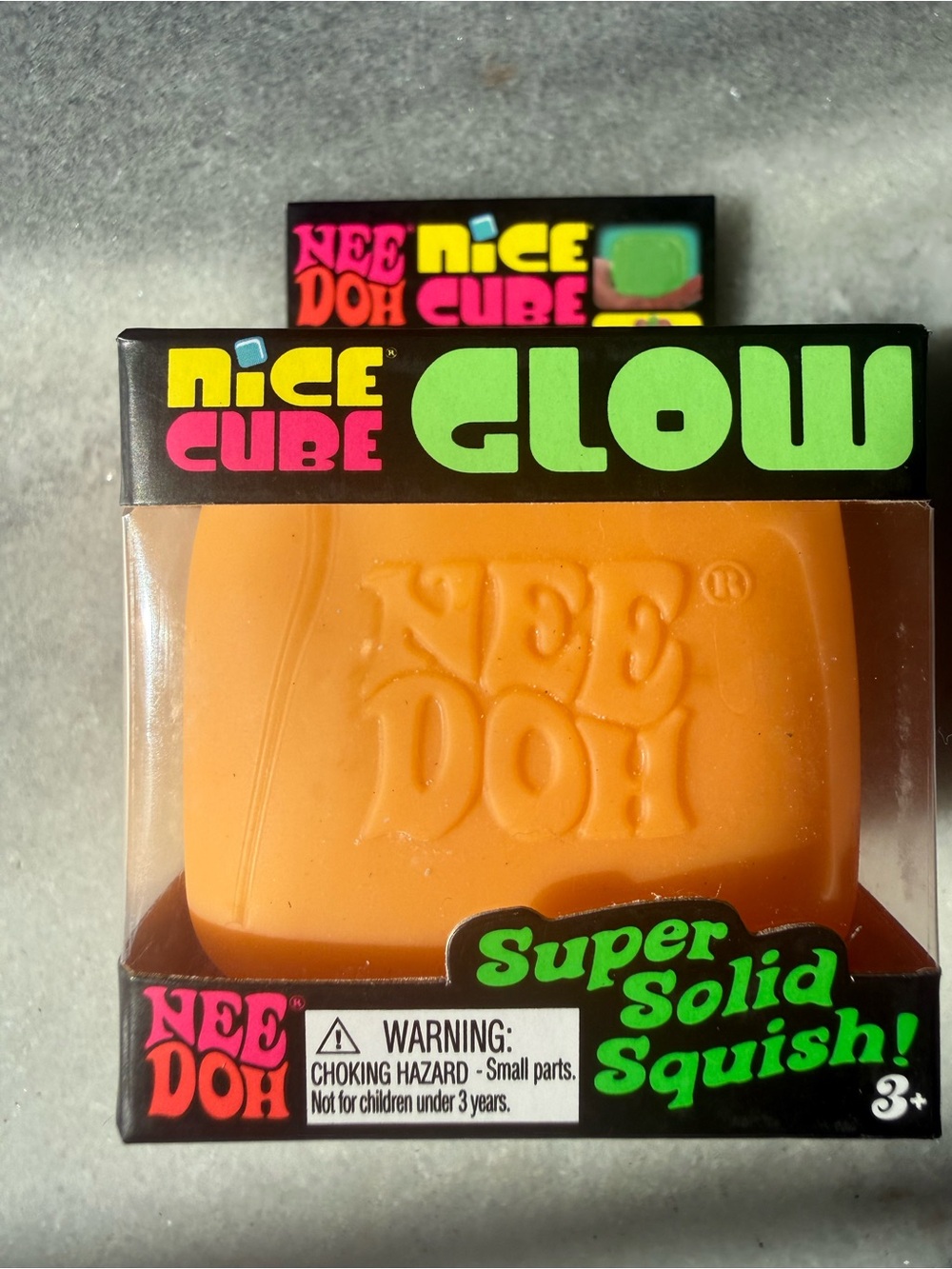 NeeDoh Nice Cube Glow Orange Super Solid Squish Toy